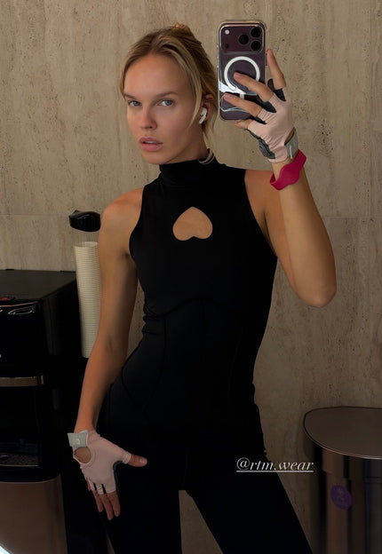 Iconic<em> @anasstart</em> wearing <a href="/products/cupids-wife-jumpsuit" title="Cupid's Wife Jumpsuit"><strong>CUPID'S WIFE MIXED</strong></a>